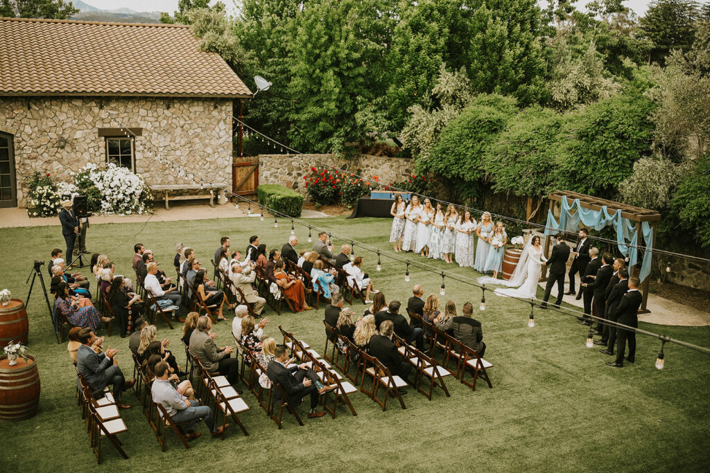 Garden wedding ceremony in wine country wedding