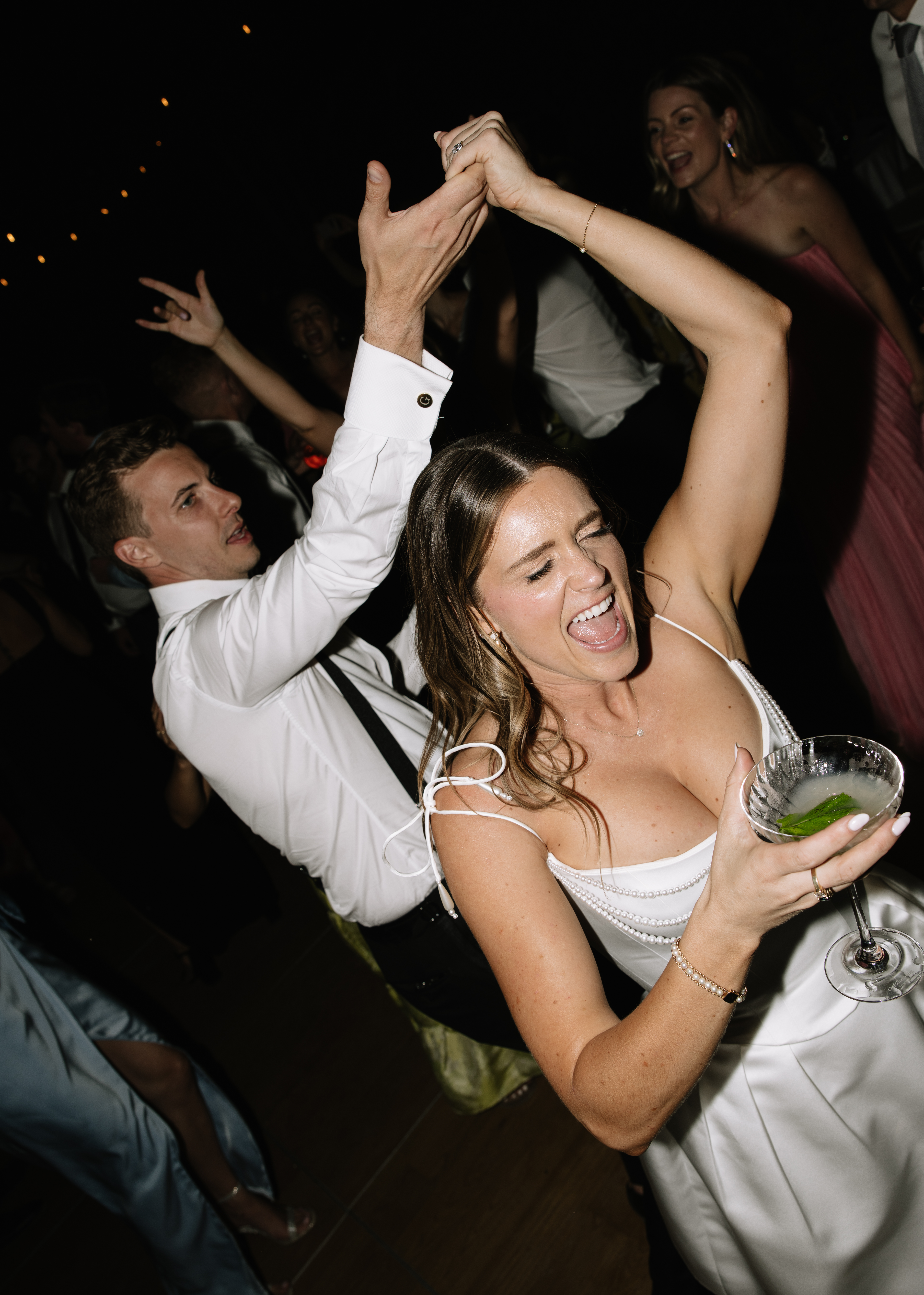 Guests dancing at Annadel Estate Winery wedding reception with AMS DJ Alex playing music.